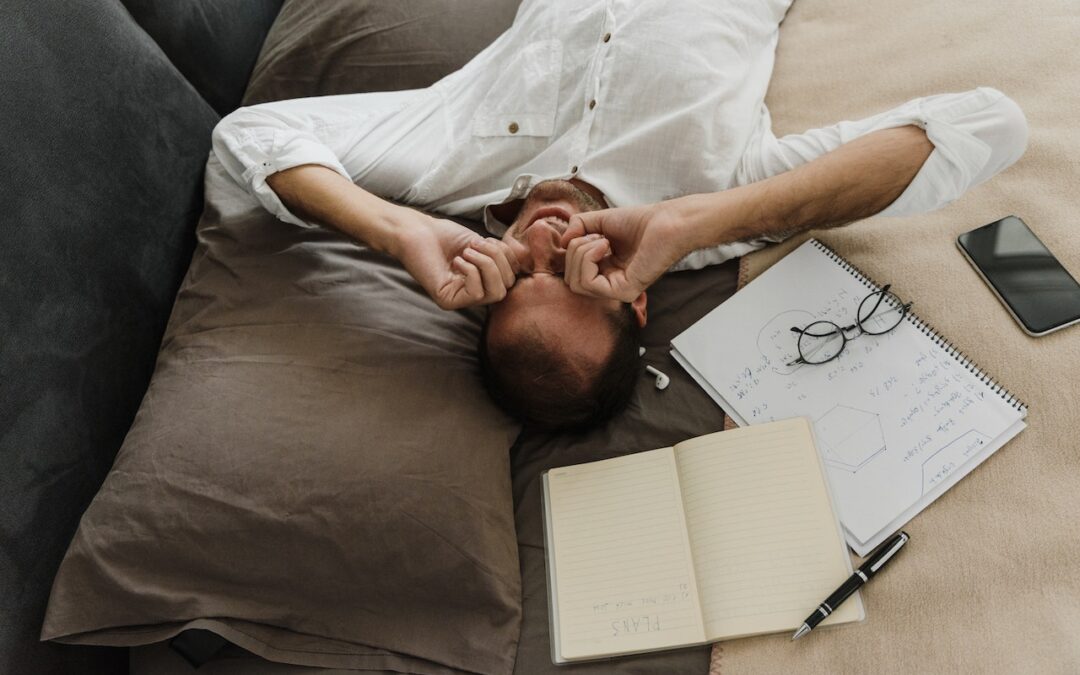 Photo by Arina Krasnikova: https://www.pexels.com/photo/an-exhausted-man-lying-on-bed-rubbing-his-eyes-5712080/